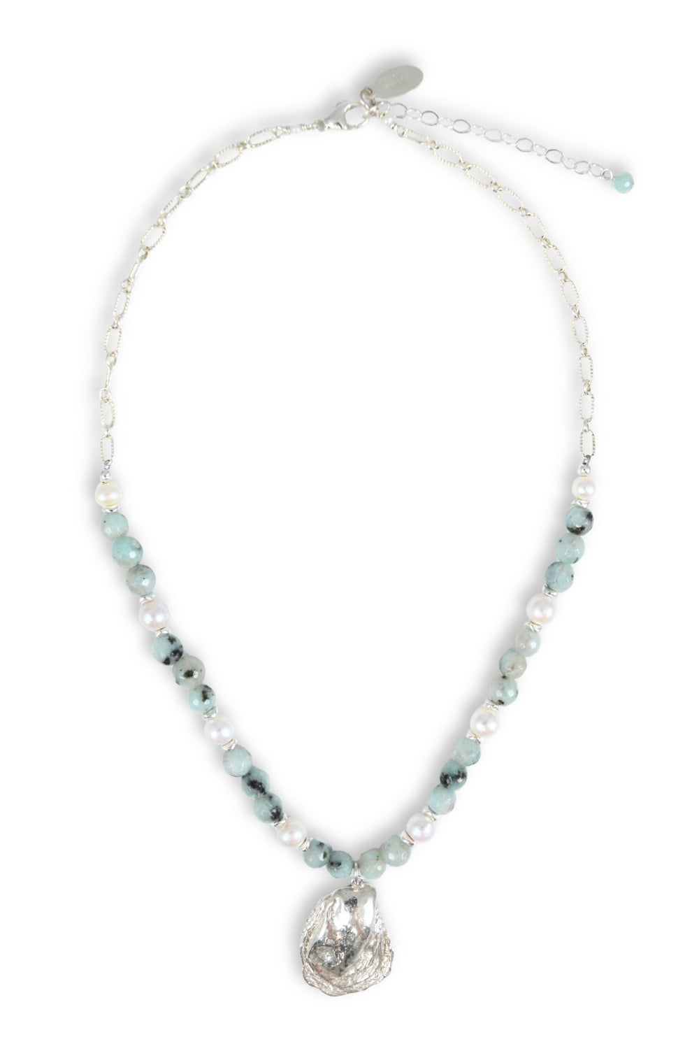Necklace with blue beads and a silver pendant on a white background