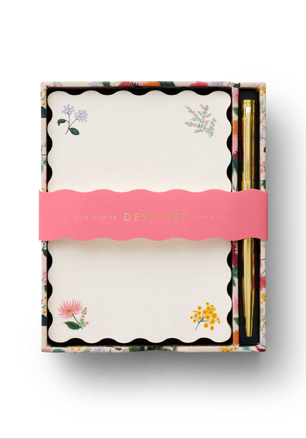 Stationery set with floral designs in a decorative box on a white background