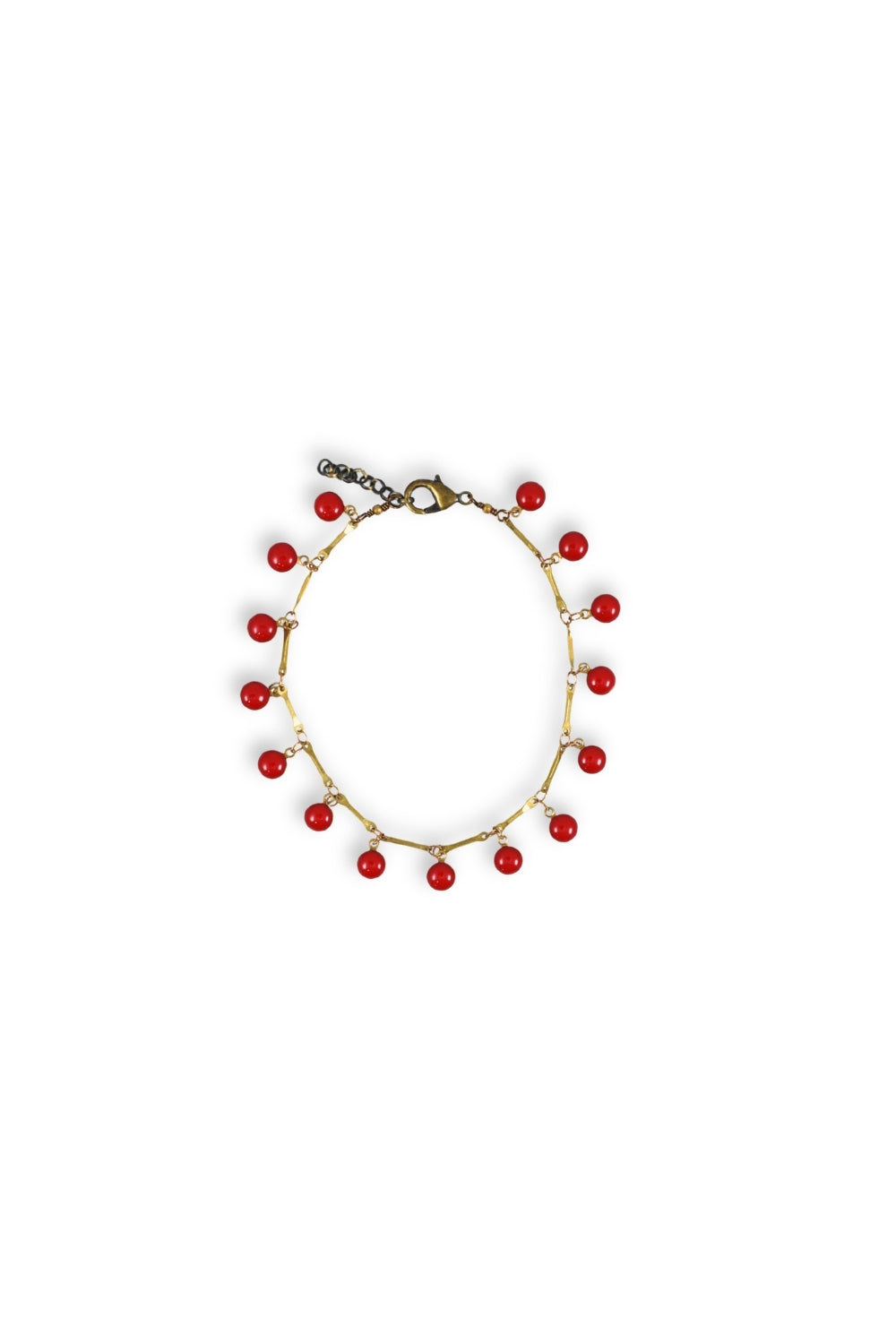 Anklet with red beads on a white background