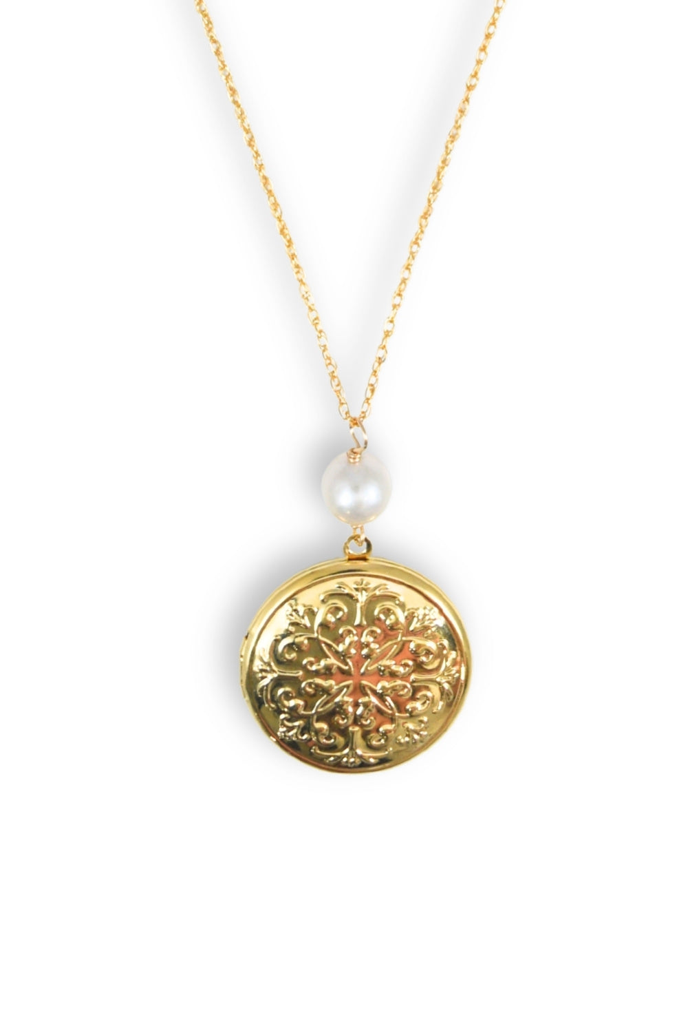Gold necklace with a decorative locket and pearl on a white background