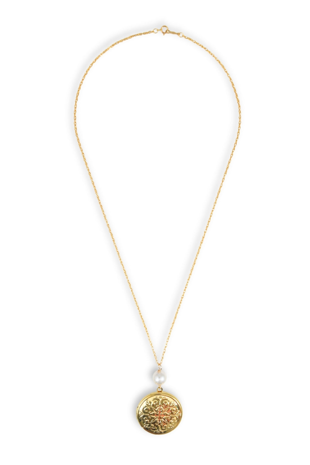 Gold necklace with a round pendant on a white background