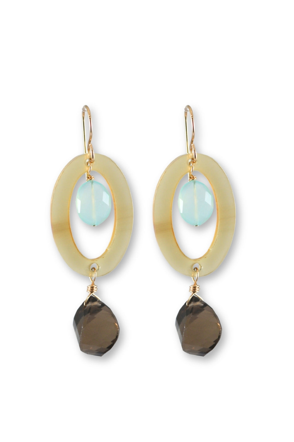 A pair of gold-tone dangle earrings featuring a large oval cutout with a light blue faceted bead inside, and a dark brown smoky stone drop below, shown on a plain white background.