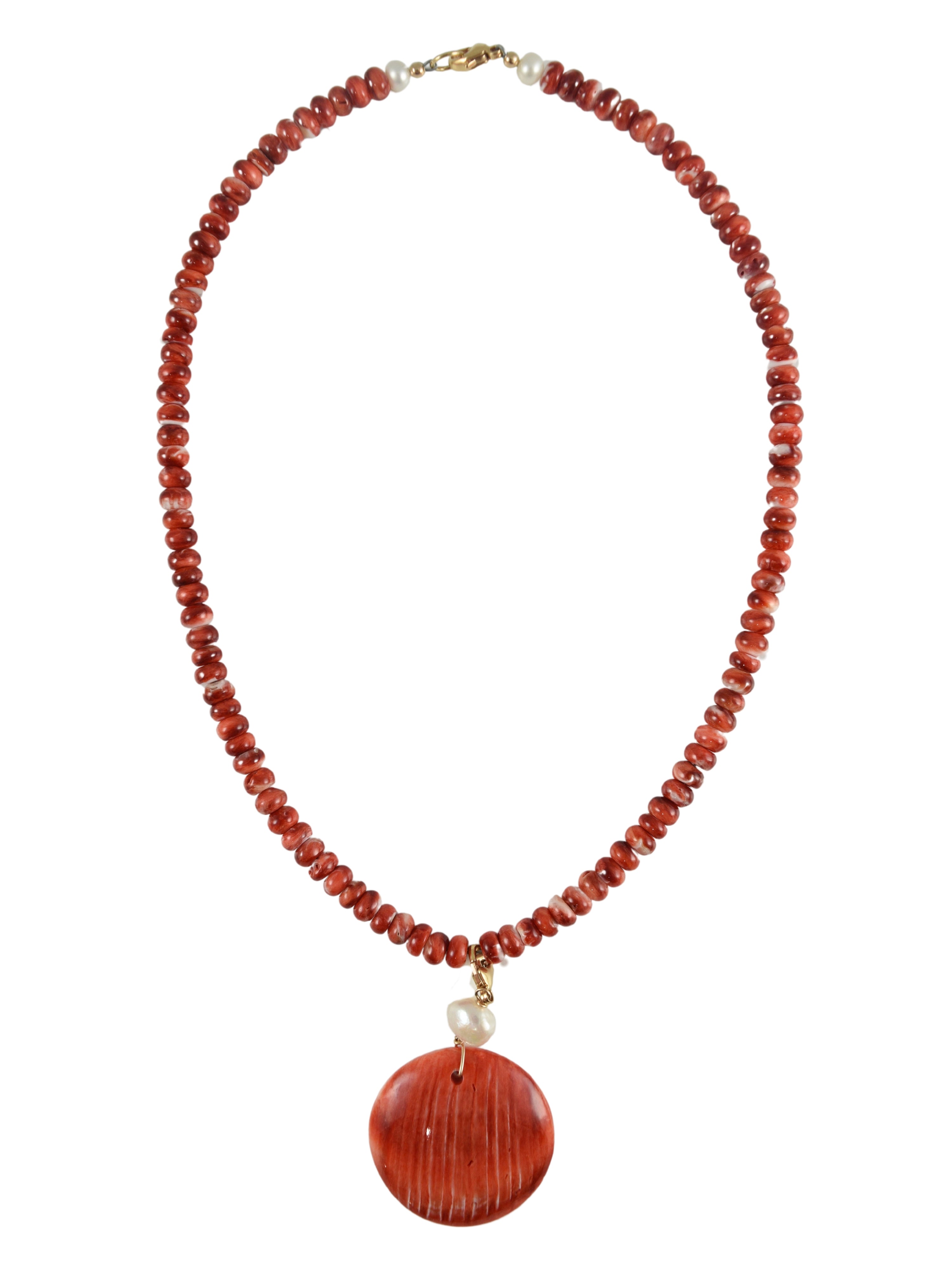 Charm can detach from the necklace