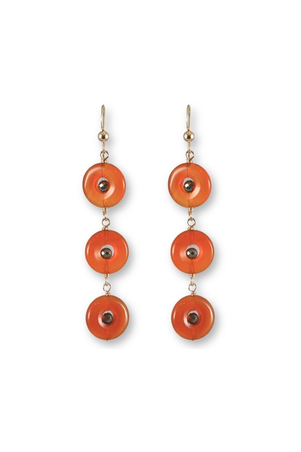 A pair of drop earrings featuring three stacked circular orange discs on each earring, suspended from gold-toned hooks, shown against a plain white background.