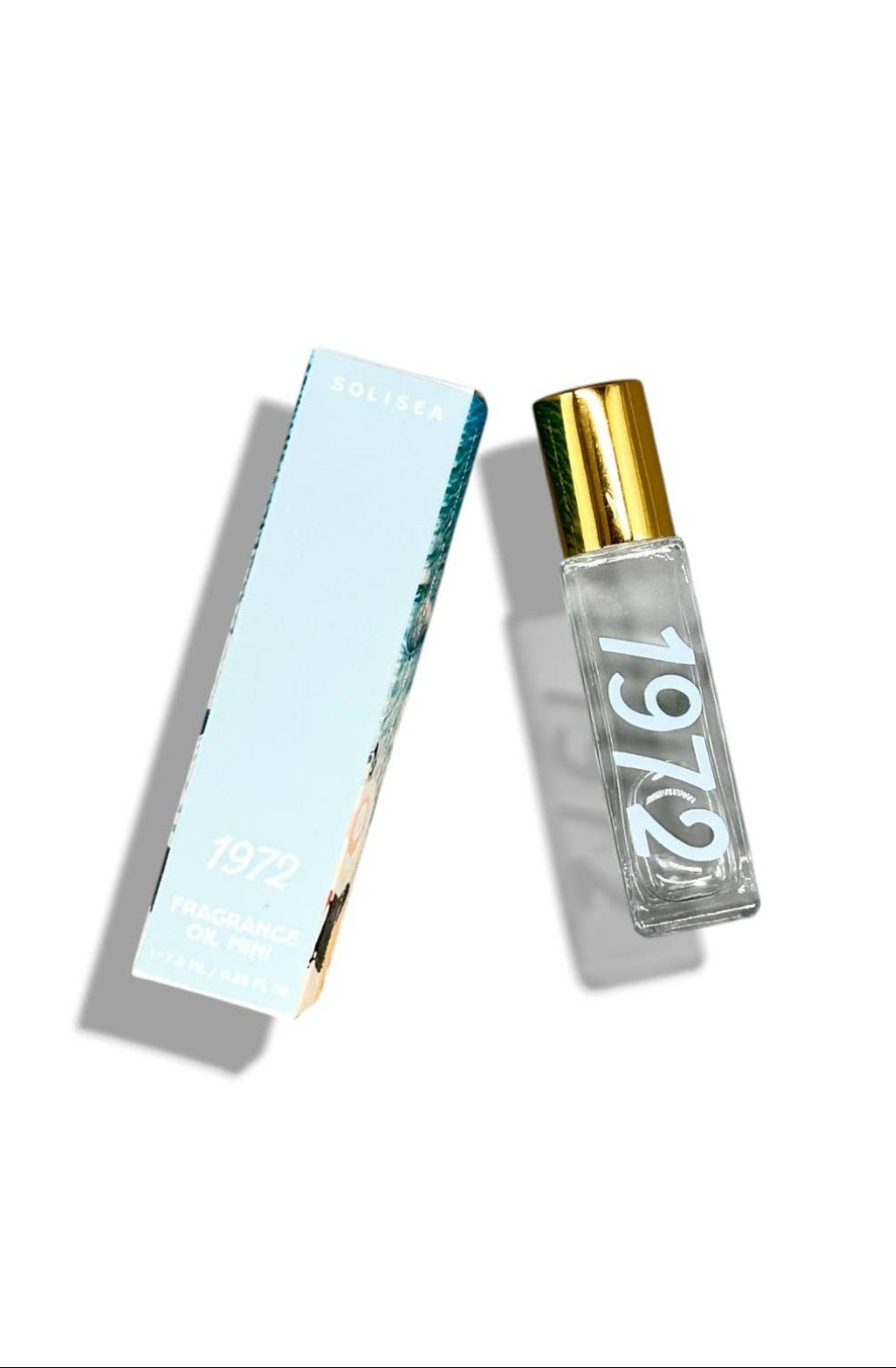 Perfume bottle and packaging with '1972' branding on a white background