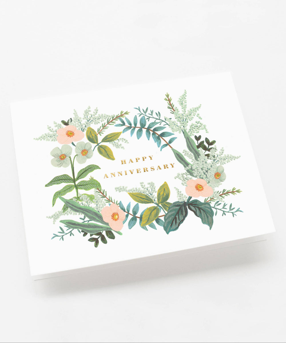 Greeting card with floral design and 'Happy Anniversary' text on a white background