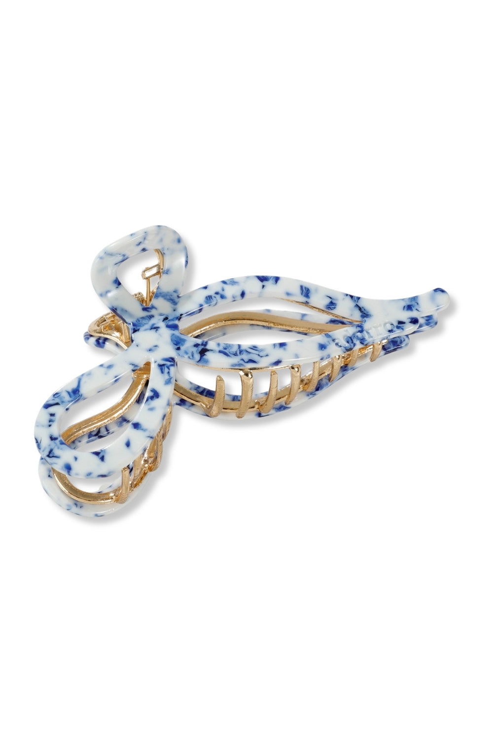 A chinoiserie hair claw clip with a white and blue marbled pattern and gold-tone metal hardware, shown on a plain white background.