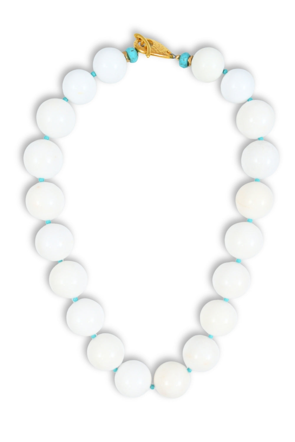 A beaded necklace made of large, smooth white oval beads with small turquoise blue spacer beads and a gold clasp, shown on a plain white background.