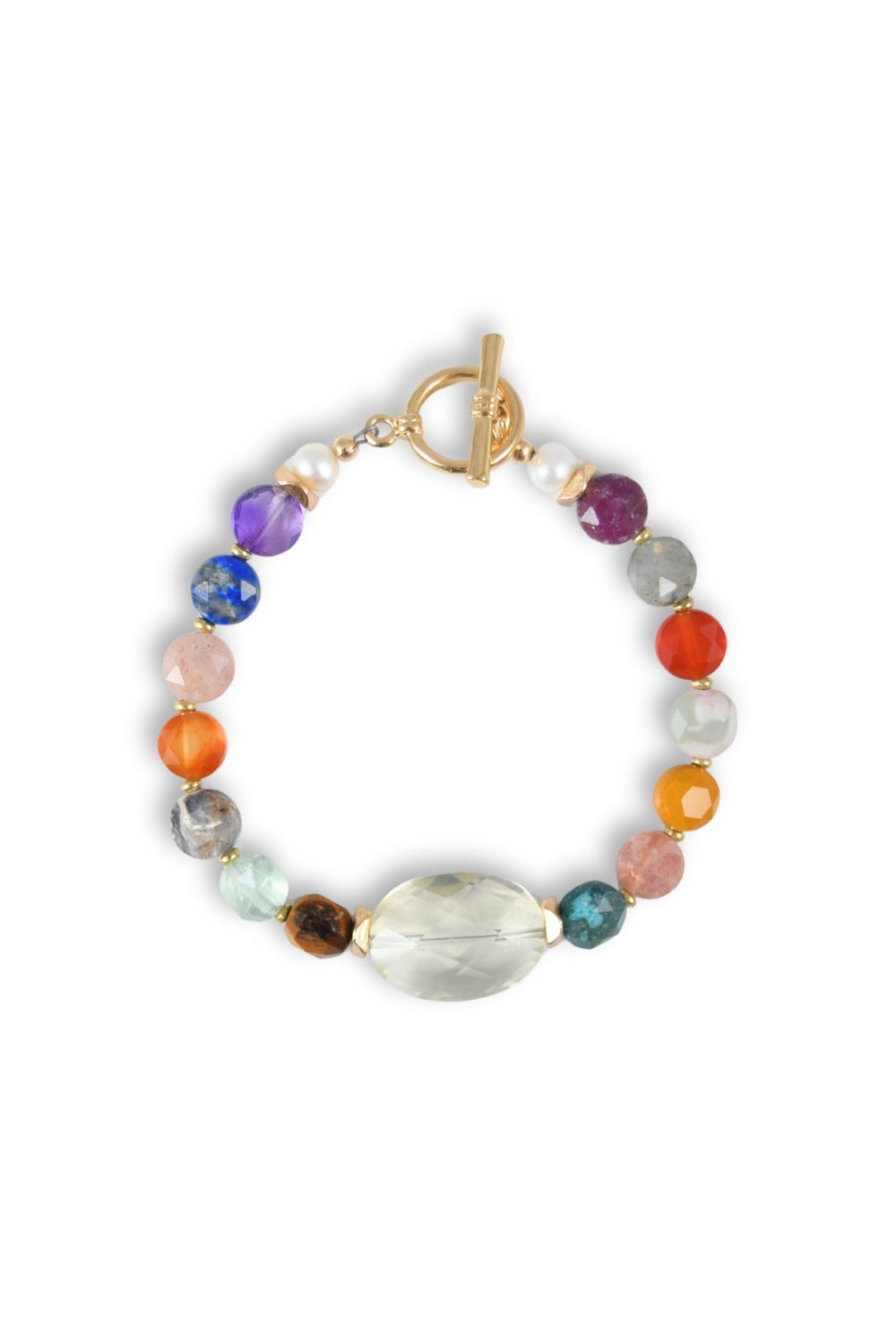 A beaded charm bracelet with a gold toggle clasp, featuring a large faceted clear oval stone at the center, surrounded by colorful round gemstone beads in purple, blue, orange, pink, gray, and green, on a white background.