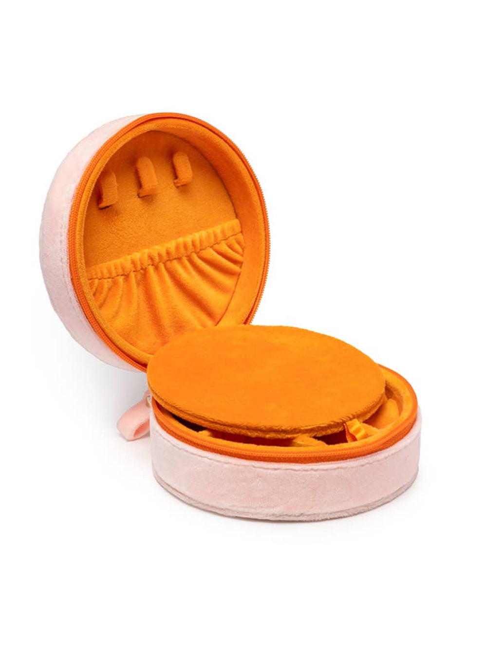 Open jewelry case with orange interior on a white background