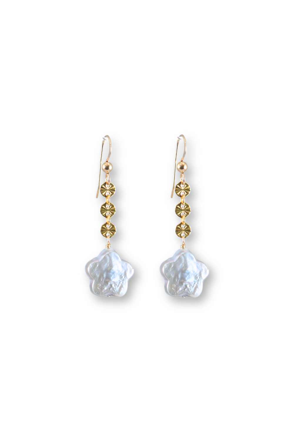 A pair of gold-tone dangle earrings featuring three small round gold beads and a larger textured, iridescent white shell bead hanging below, set against a plain white background.