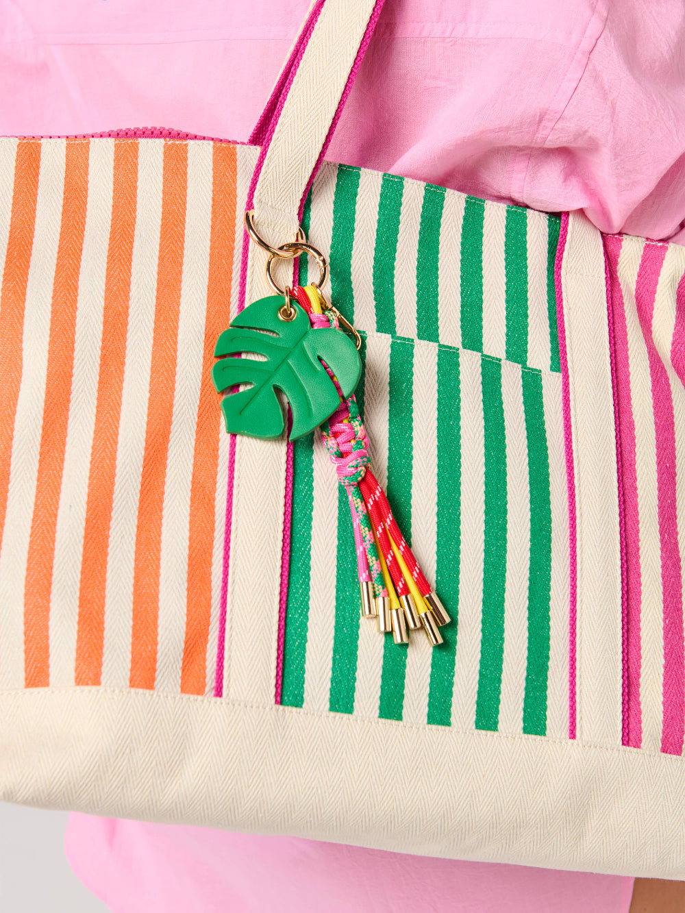 palm leaf bag charm on tote bag