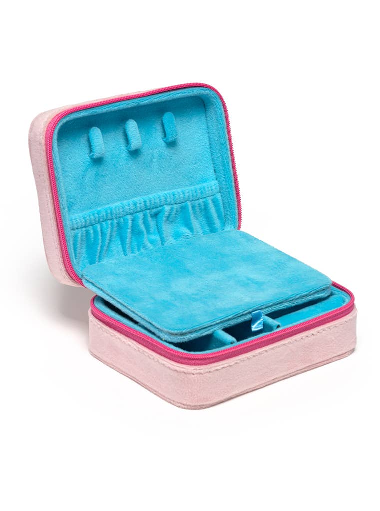 Pink jewelry case with blue interior on a white background