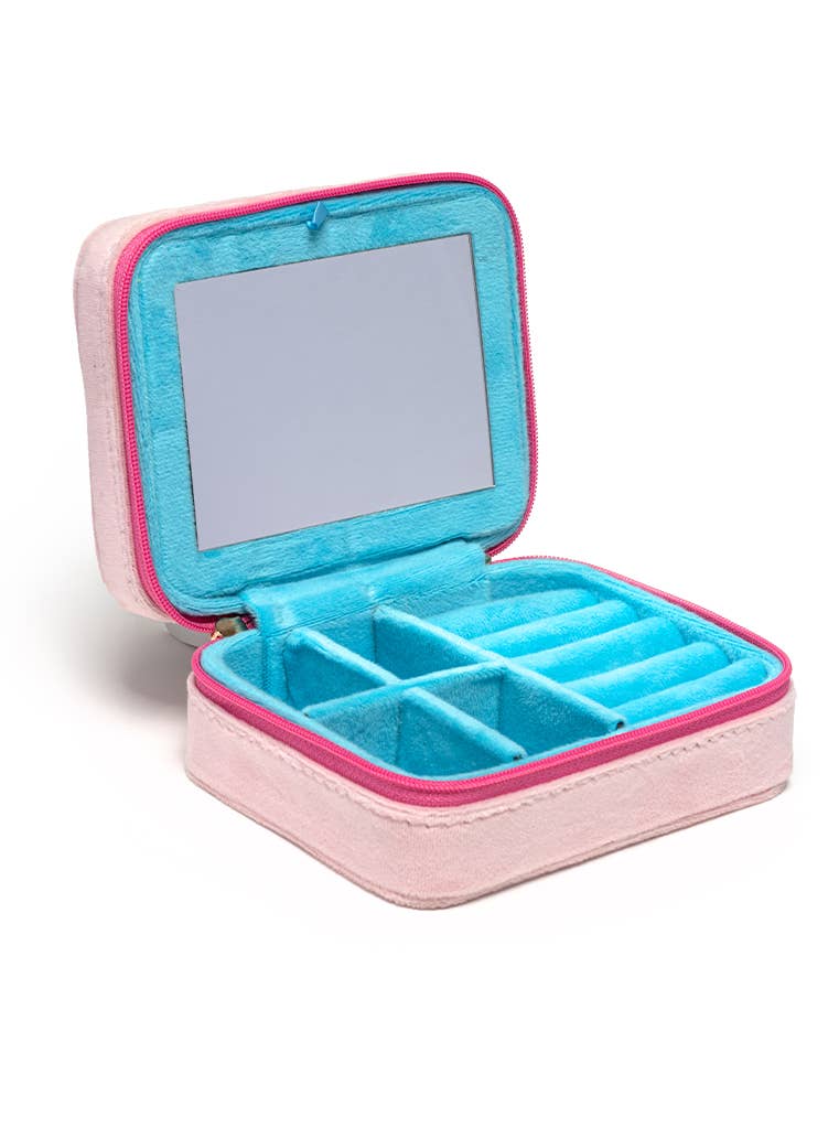 Pink and blue jewelry case with mirror on a white background