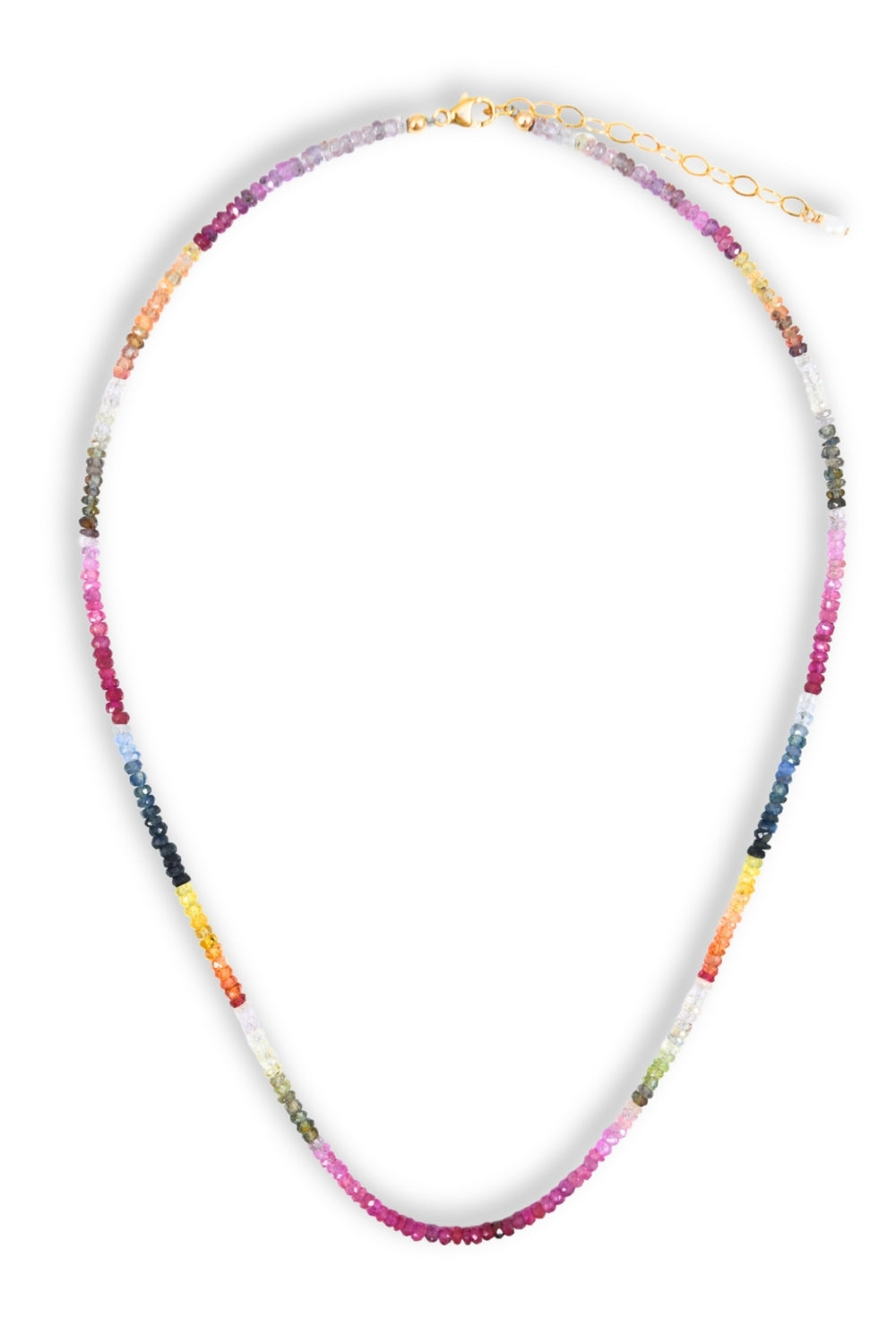 A beaded necklace with a multicolor gradient design transitioning through pink, purple, blue, yellow, and white, finished with a gold clasp and extender chain.