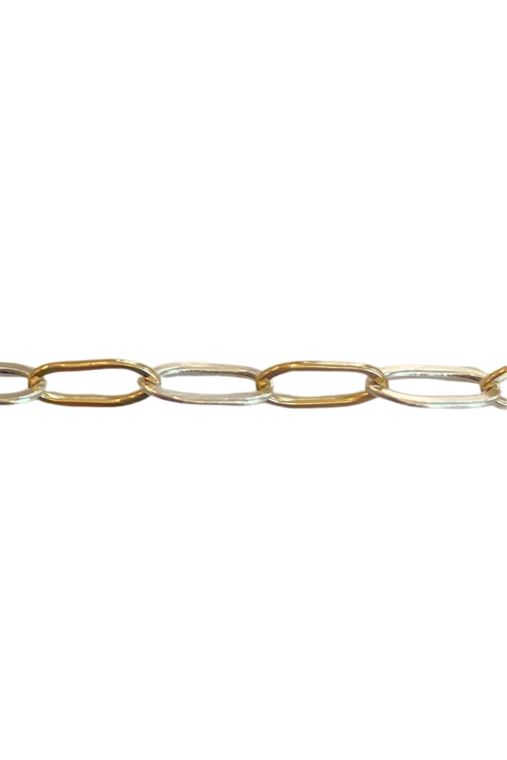 Gold and silver chain on a white background