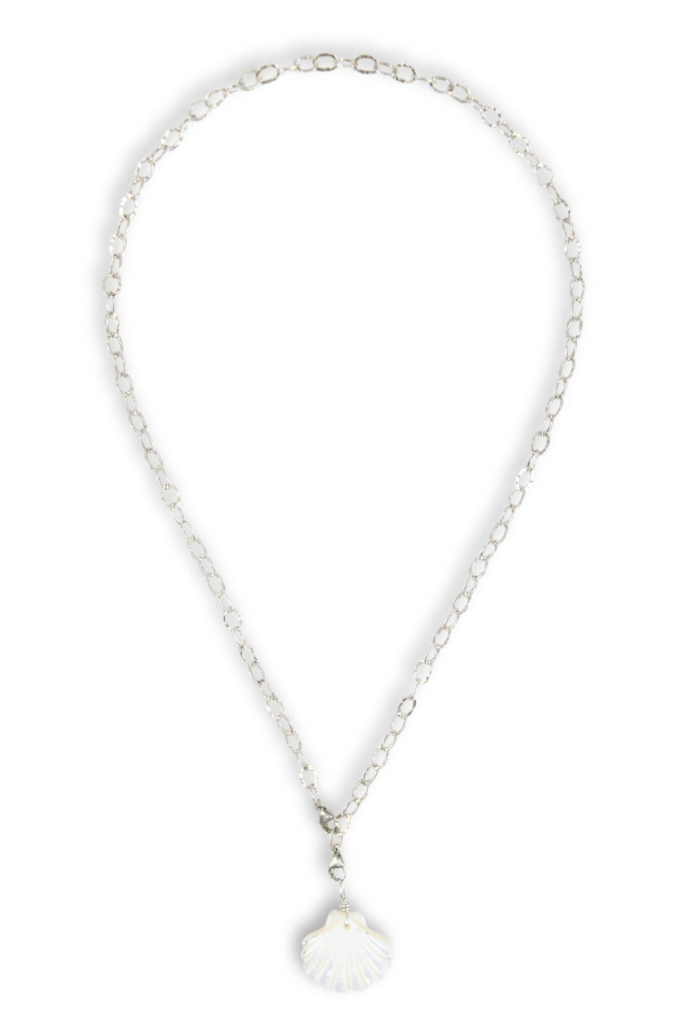 A silver chain necklace featuring a small white shell-shaped pendant, displayed against a plain white background.
