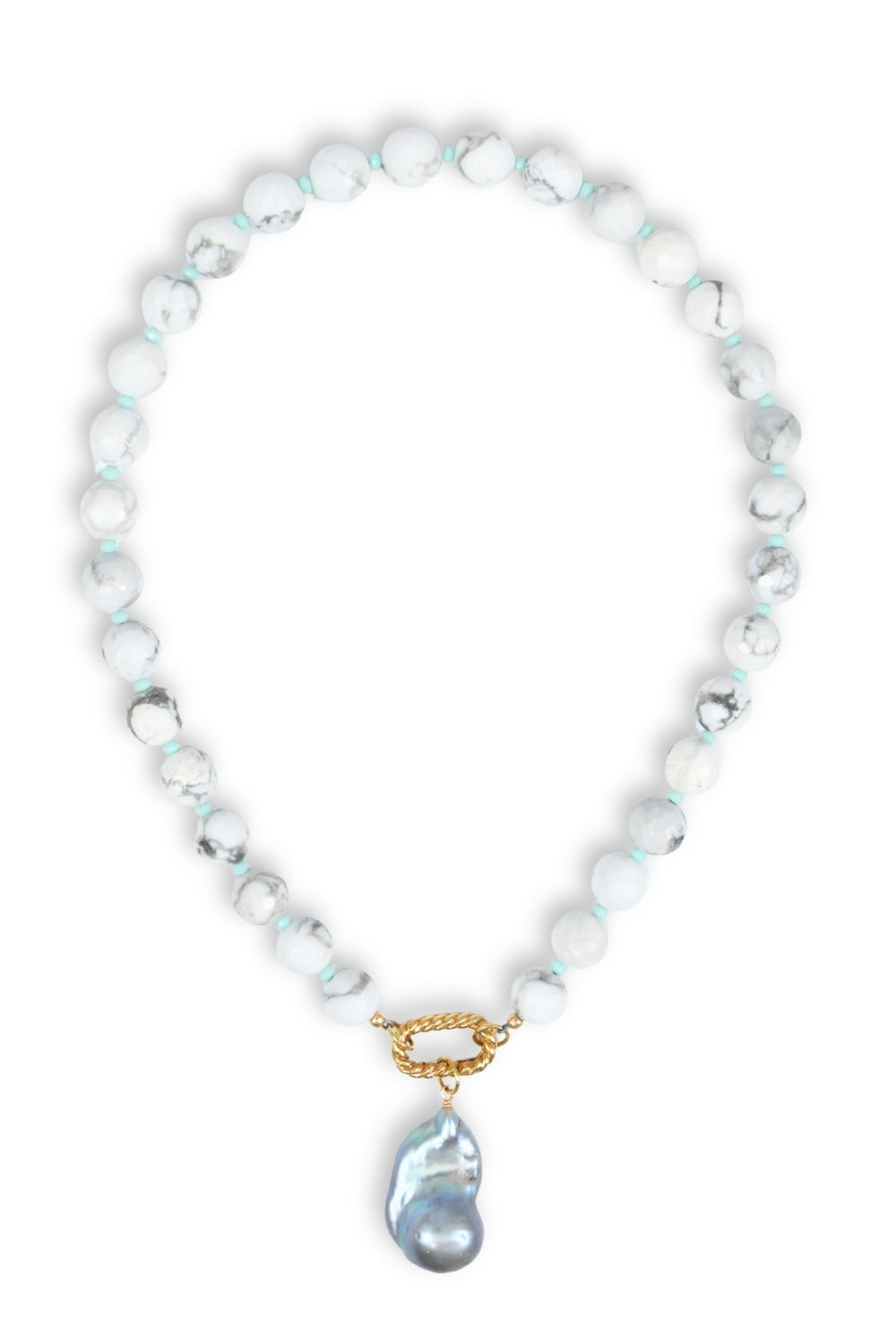 Beaded necklace with a gold clasp and large pearl pendant on a white background