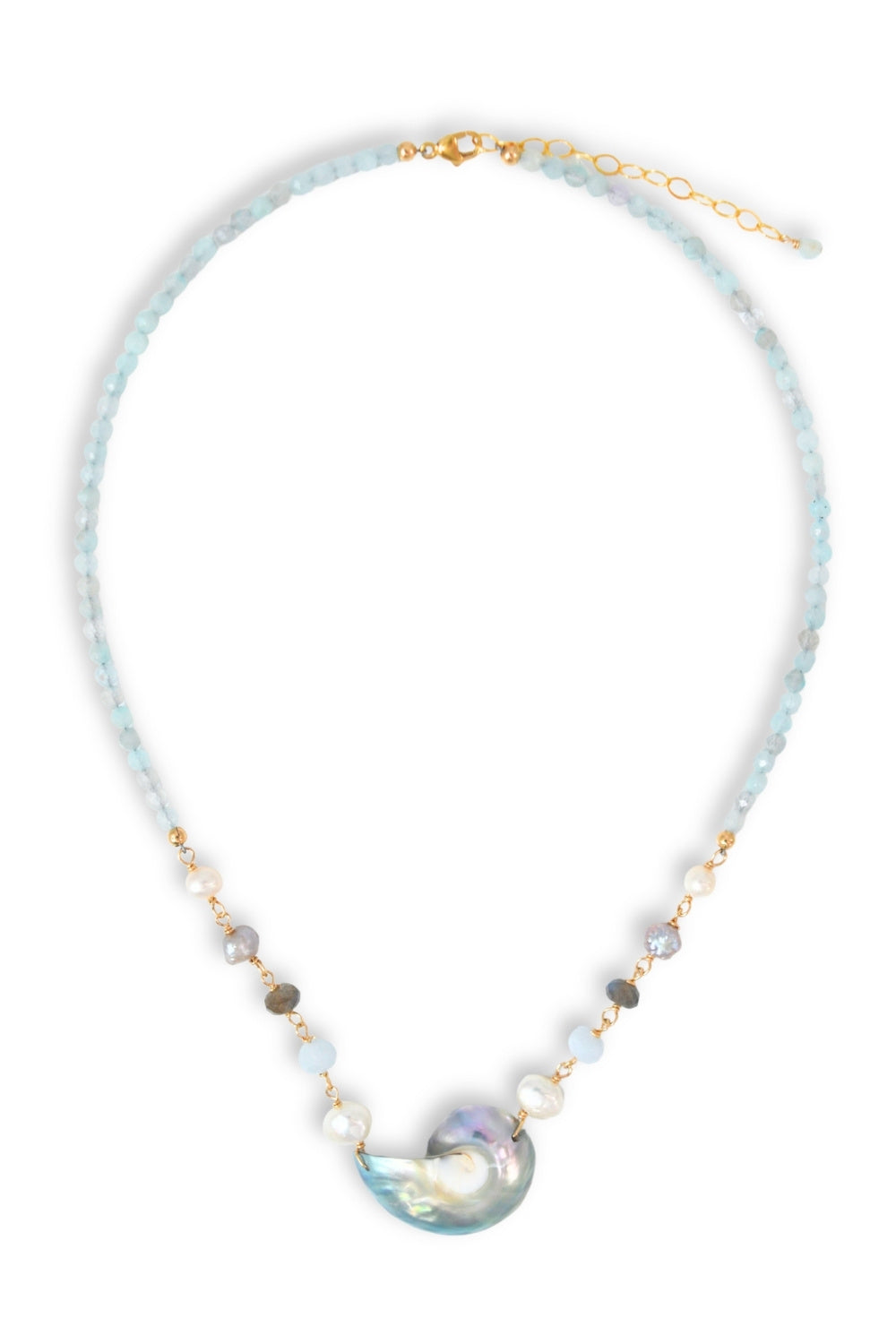 Necklace with a large central shell pendant and smaller beads on a light blue cord against a white background