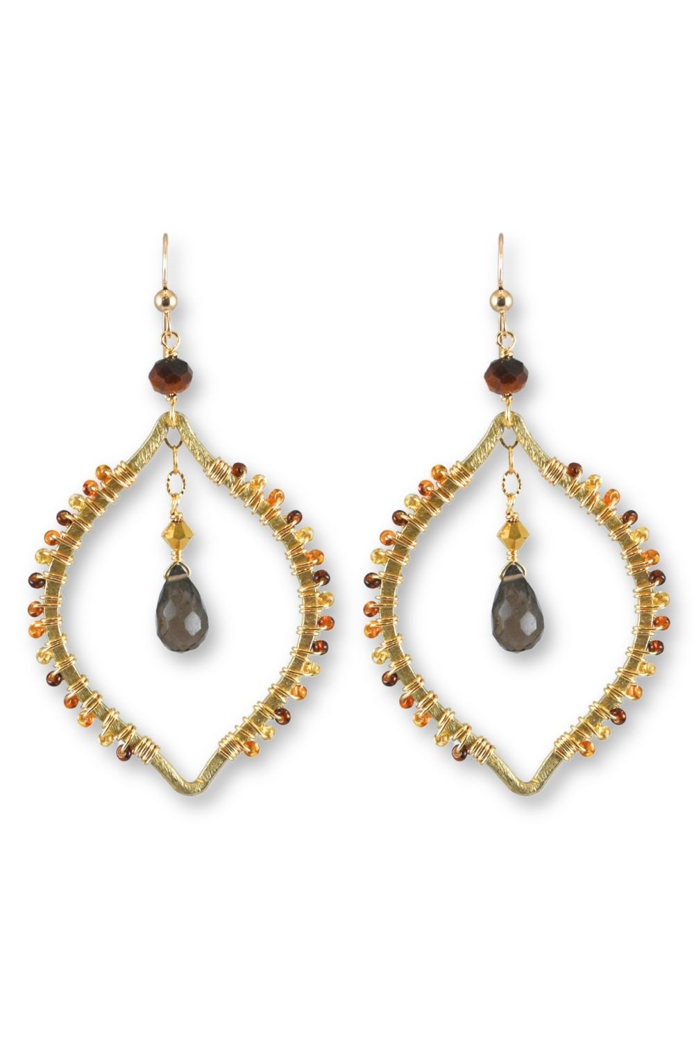 A pair of bohemian-style dangle earrings featuring gold-toned metal frames, small amber and brown beads, and a dark gray teardrop gemstone in the center of each earring.
