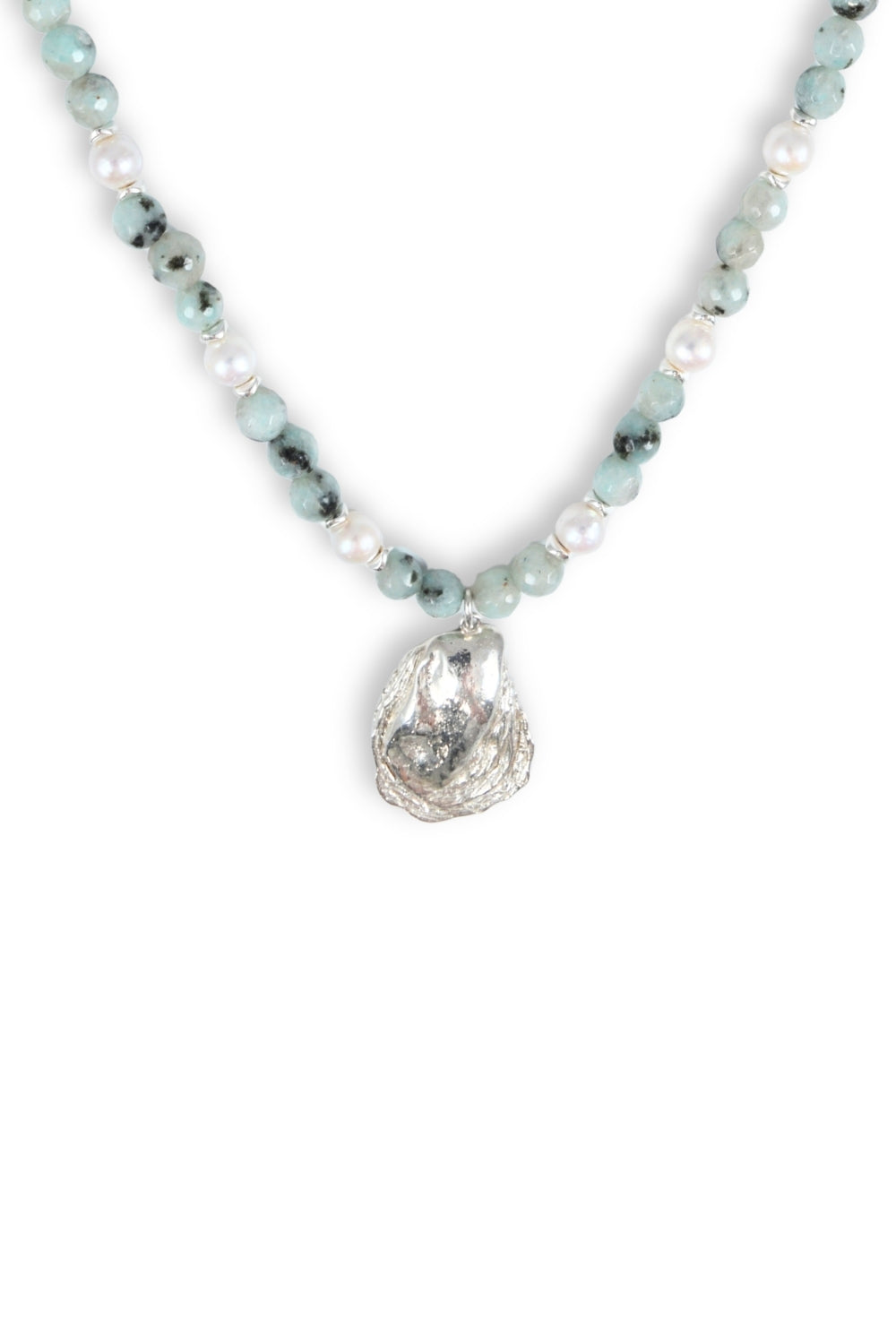 Necklace with a silver oyster shell pendant on a white background